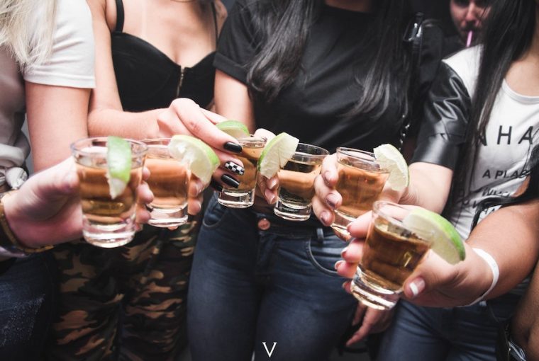 women drinking vegan tequila