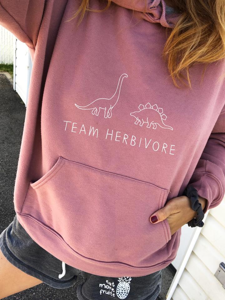 pink pullover sweatshirt Team Herbivore message Wholesome Culture brand