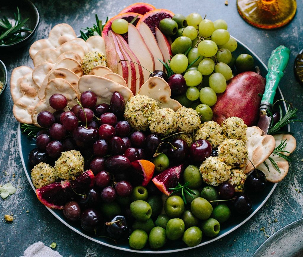 plate of grapes and other snacks