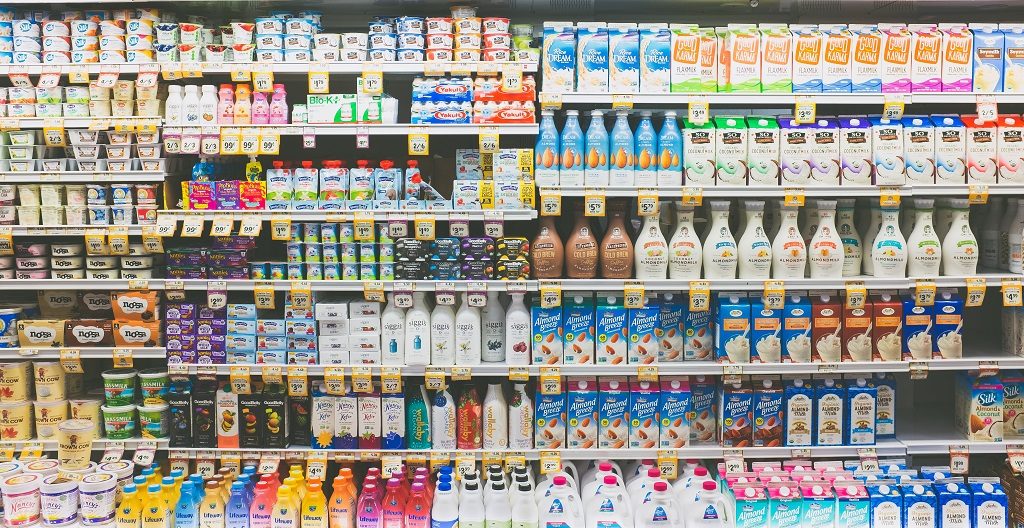 vegan milk section in grocery store