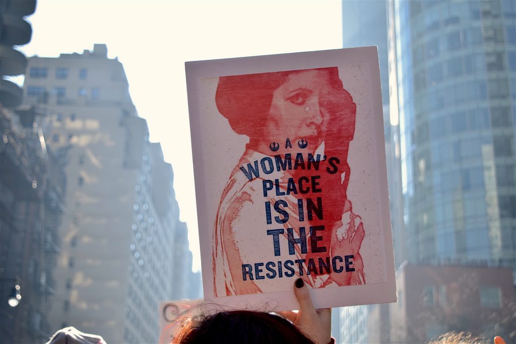 a rally in the city - woman's place is in the resistence