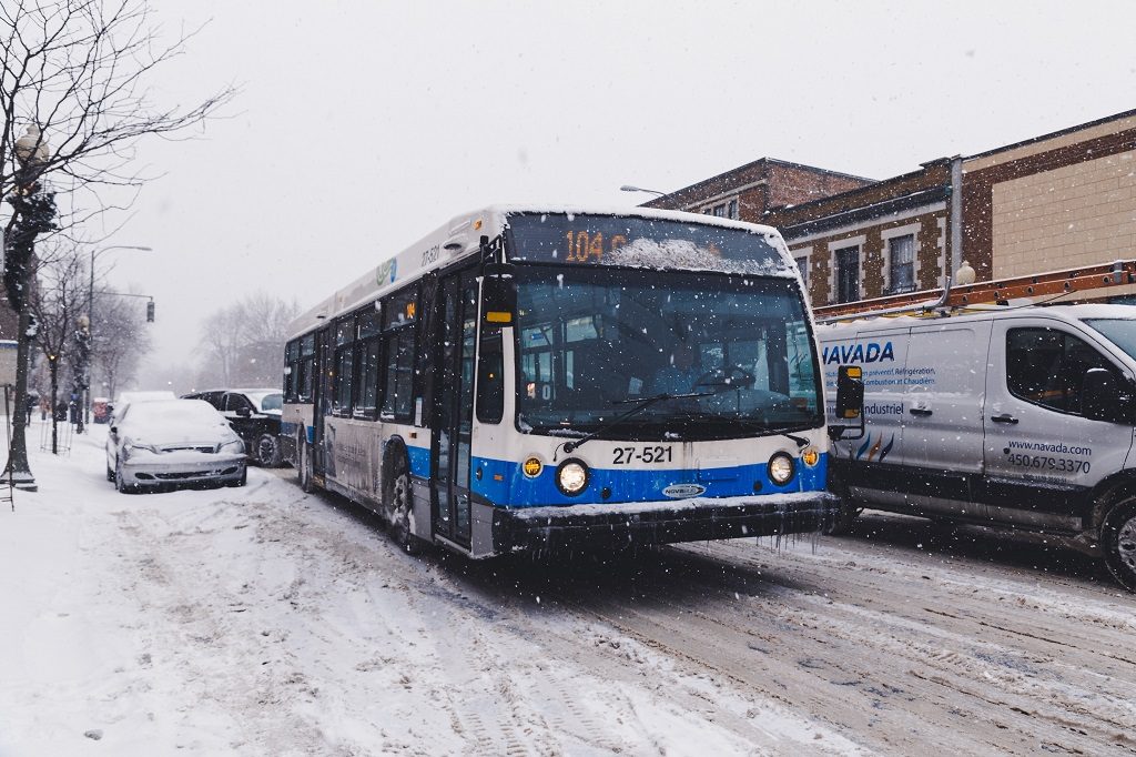 public bus on snowy city street