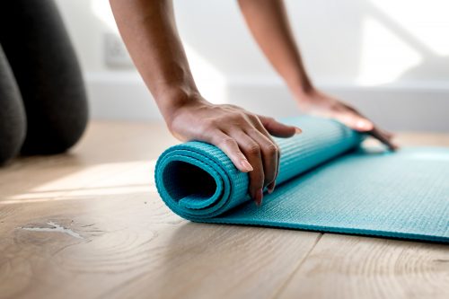 Unrolling yoga mat 