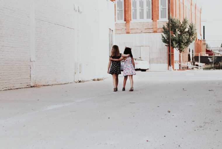 kindness in everyday little girls hugging