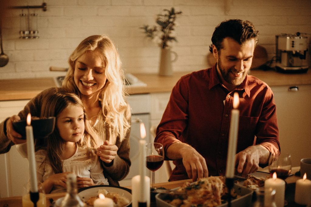 family eating a vegan holiday dinner