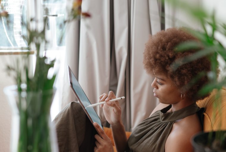 woman using eco-friendly tablet