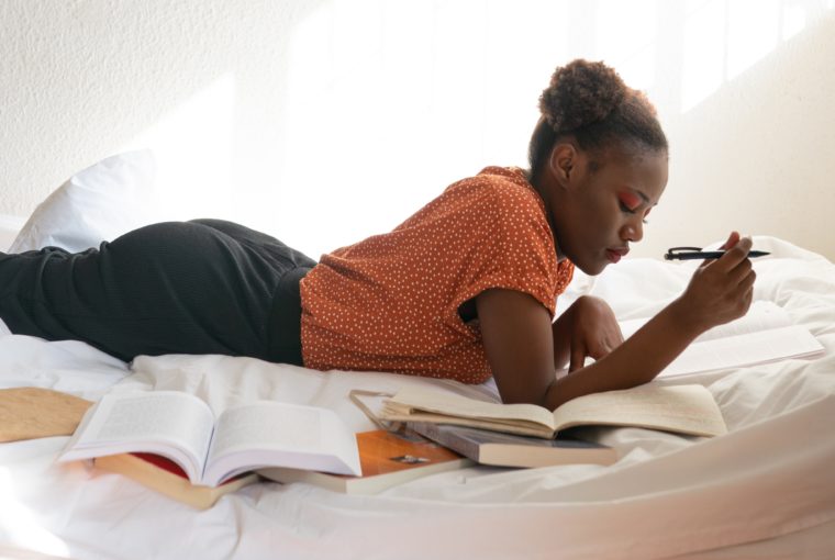 woman reading self-love books