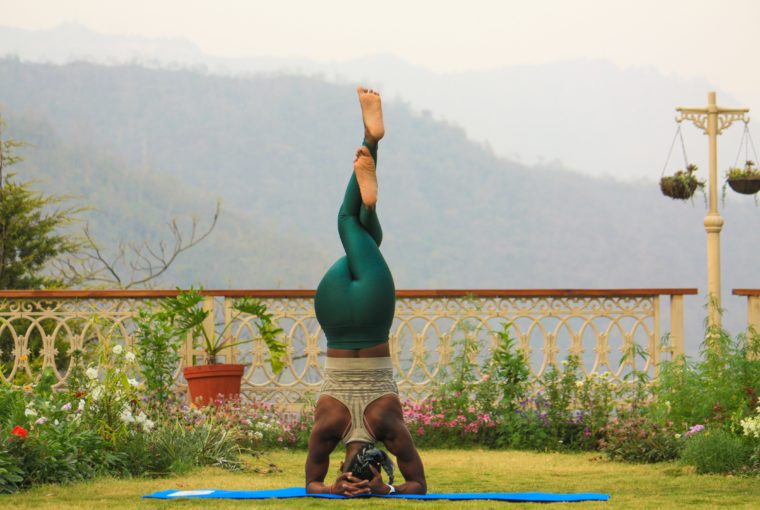 woman practicing yoga for international day of yoga