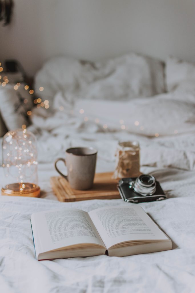 self-care idea: create a relaxing bedtime routine with tea and a good book